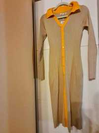 Beżowo-pomarańczowa sukienka midi marki Sinsay