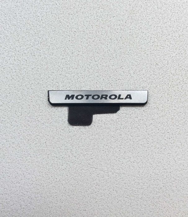Шильдик із сіткою динаміка для смартфонів Motorola XT-890/910/912