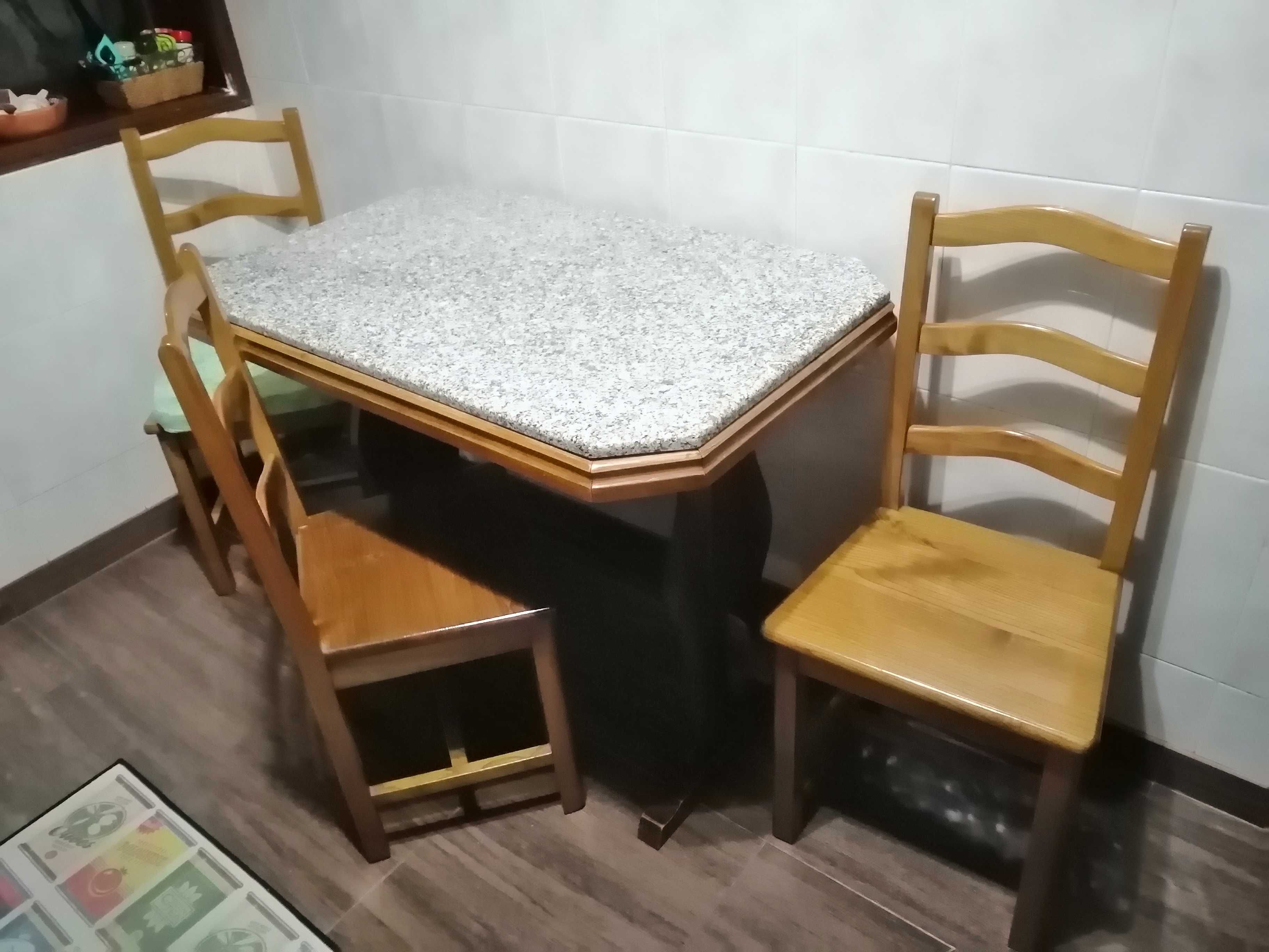 Mesa com tampo em granito cadeira