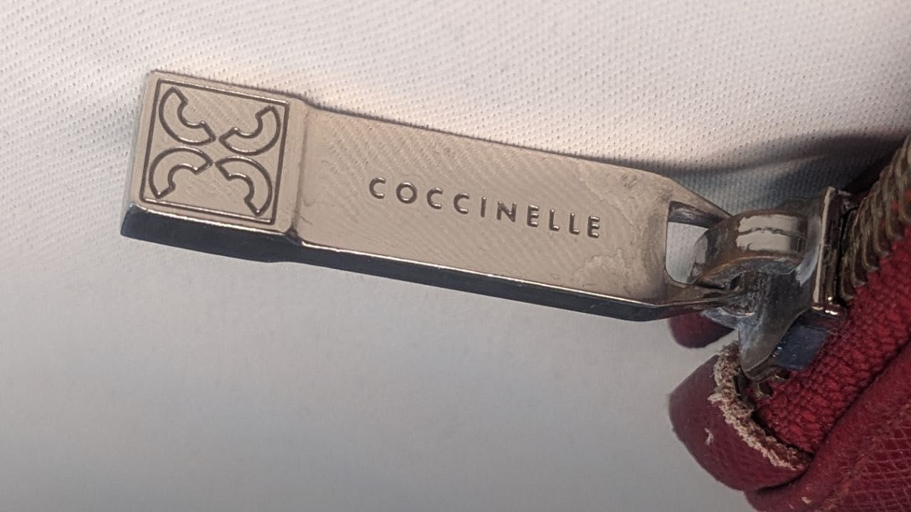 Сумочкка космктичка Coccinelle   original