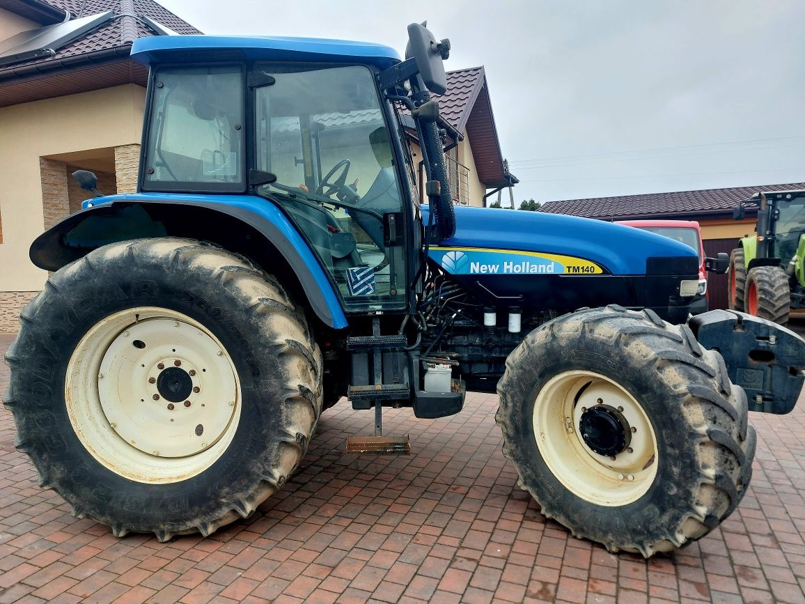 New holland TM 140  rok 2002