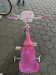 Bicicleta rosa e branca