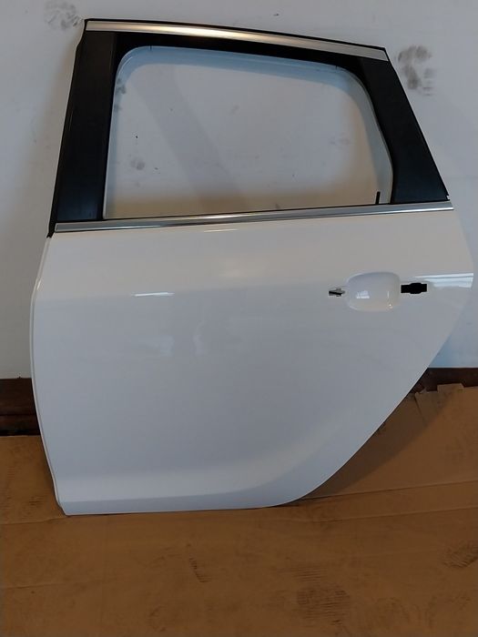 Drzwi lewe tylne opel astra j Y40R HB sedan