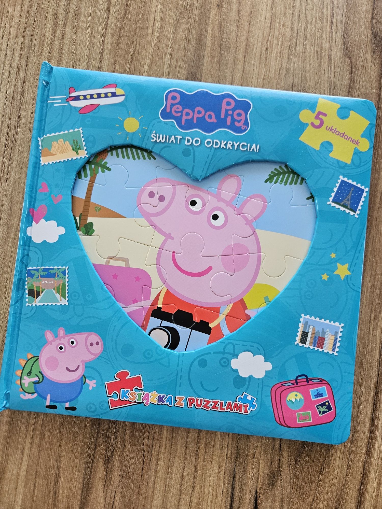 Ksiazka puzzlami peppa pig świat do odkrycia