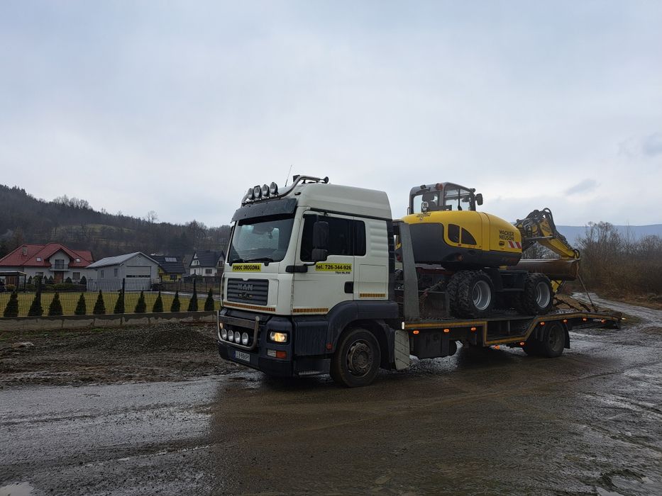 Pomoc drogowa Michòw laweta transport usługi holowanie 24h