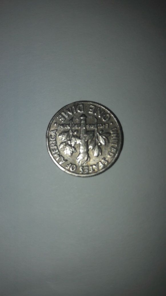 Коллекционную монету LIBERTY ONE DIME