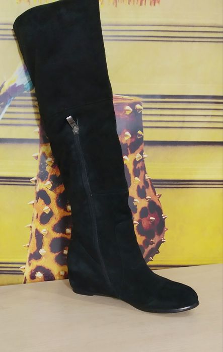 Высокие зимние сапоги