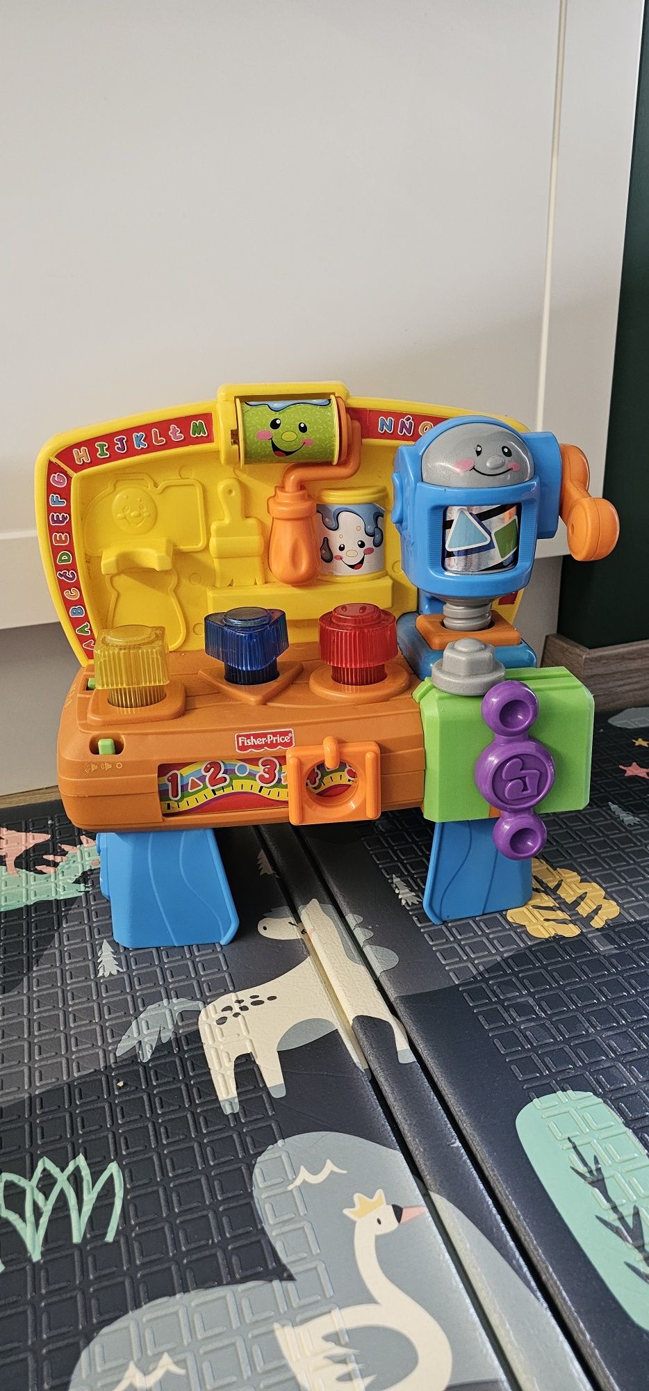 Stolik edukacyjny/muzyczny Toyz oraz warsztat mechanika Fisher-Price