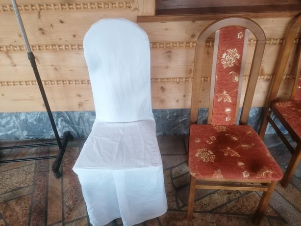 Pokrowce na krzesła białe około 120 szt