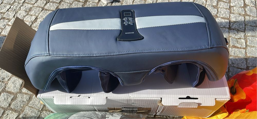 Massageador, novo na caixa sem nenhum vestigio de uso com carregador