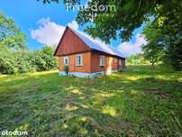 Duża działka 5093 m² z domem drewnianym
