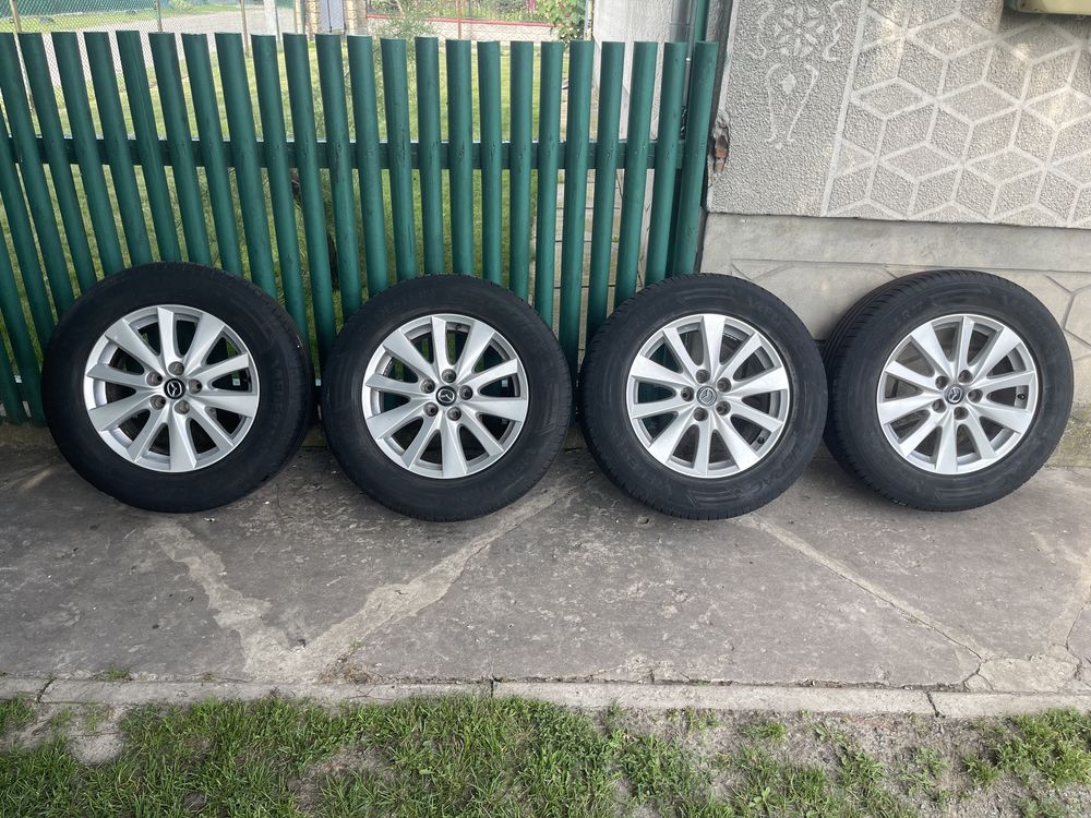 Диски колеса з зборі з Mazda. 225/65/R17 VREDESTEIN