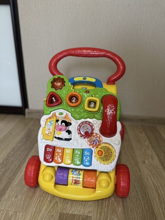 Дитячі ходунки Vtech з ігровою панеллю/толокар
