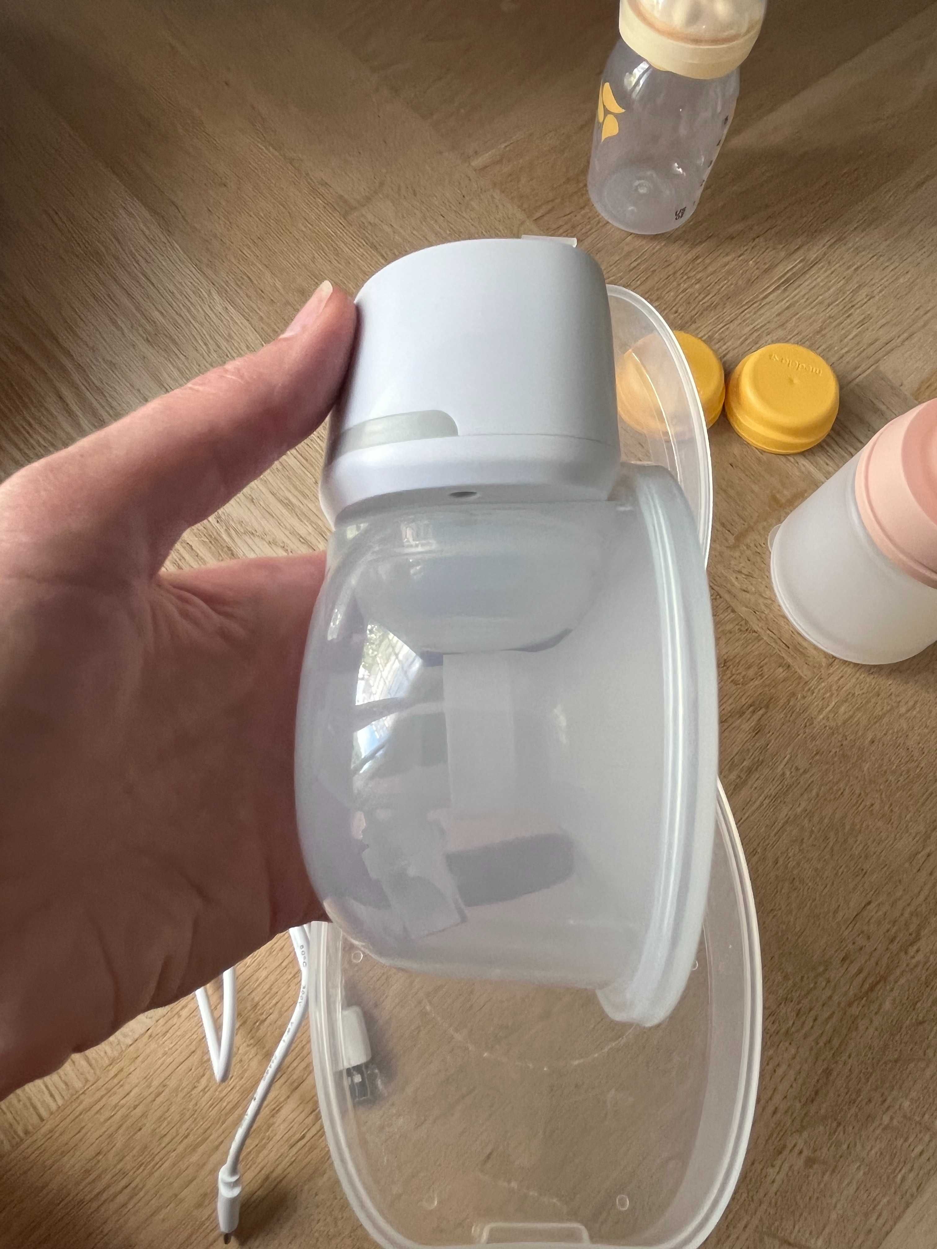 Bezprzewodowy laktator Bellababy + akcesoria do przechowywania mleka