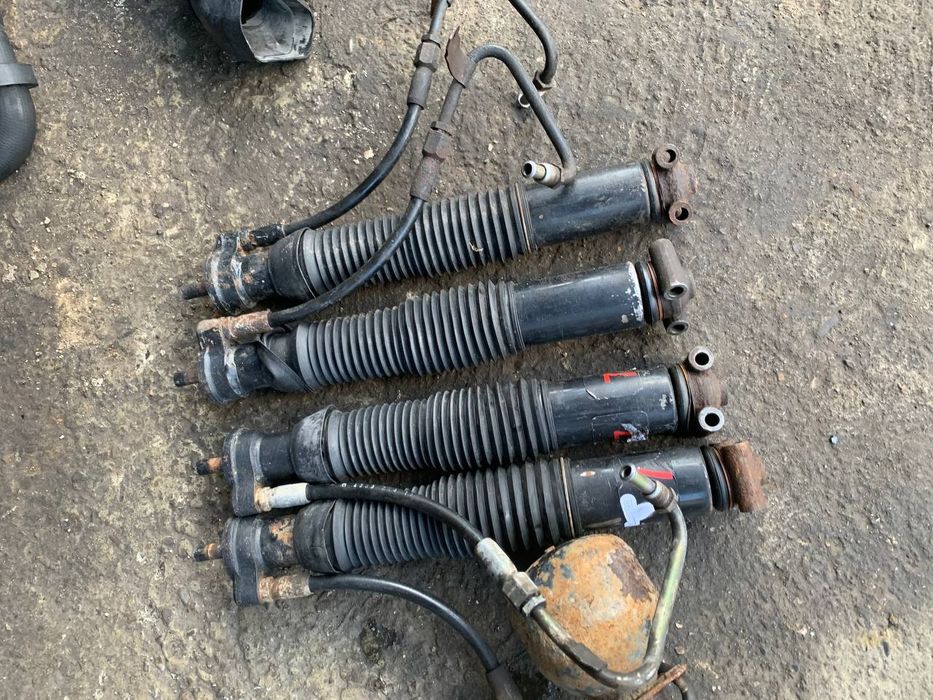 Амортизатори,груші, стойки гідропідвіски w210,124