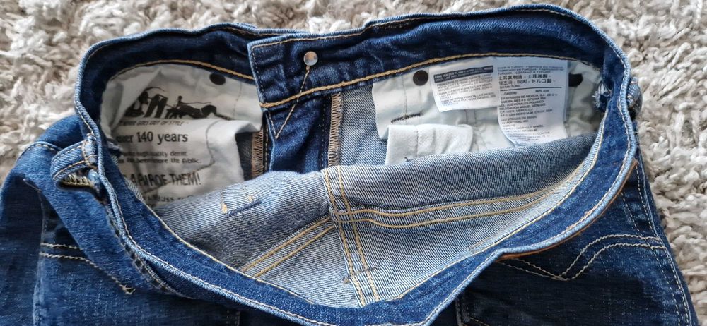 Jeansowe spodnie damskie Levi's r. M 27/32