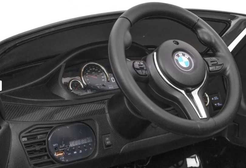 BMW X6M używany samochodzik elektryczny dla dziecka MP3 pilot