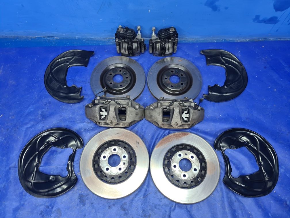 KOMPLET tarcz 375mm 340mm zaciski 6-tłoczkowe AUDI Q7 4M A6 C7 C8 OEM