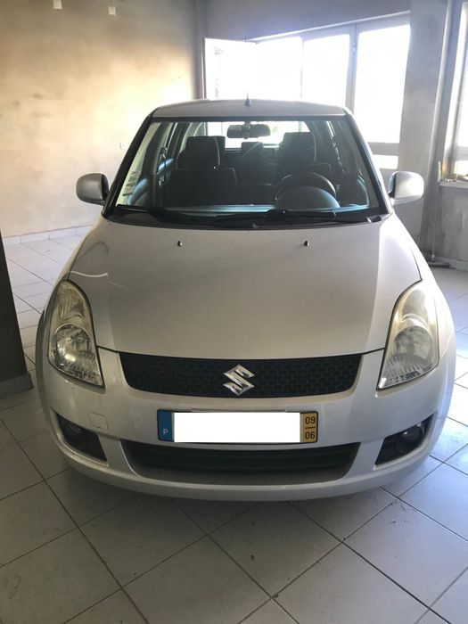 Suzuki Swift 1.3 – 2009 | 75cv | 5 portas | Manual | Cinzento