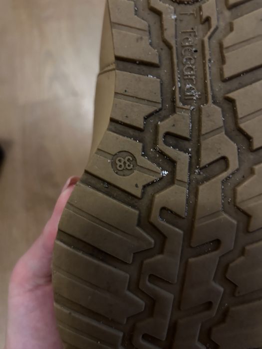 Коричневі чоботи