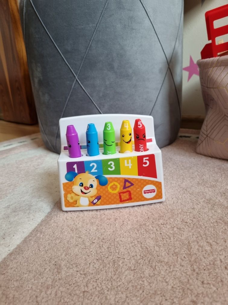 Zabawki interaktywne Fisher Price świecący zegarek Chase i różdżka gra