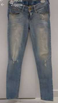 Spodnie jeansy jeansowe dżins damskie Bershka dziury XS 34