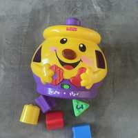 Garnuszek na klocuszek Fisher Price