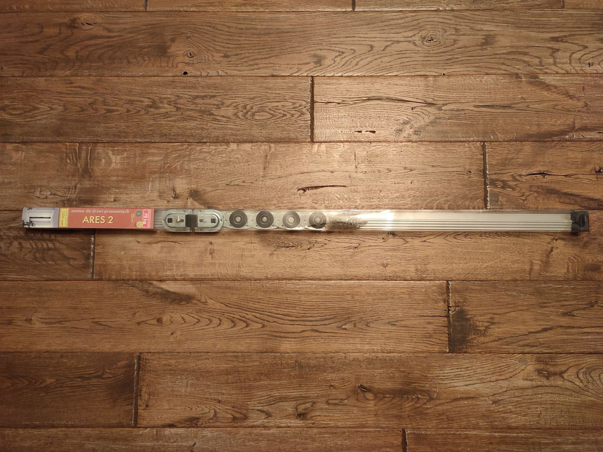Zestaw do drzwi przesuwnych ARES 2/120cm/70kg (prowadnice + rolki)