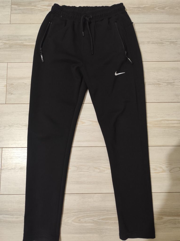 Штани Nike розпродаж