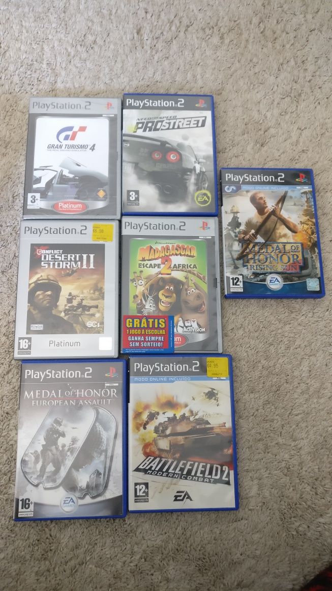 Jogos PS2 em óptimo estado + volante como novo