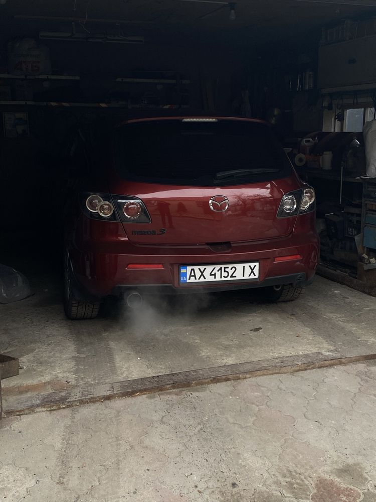 Mazda 3.        .