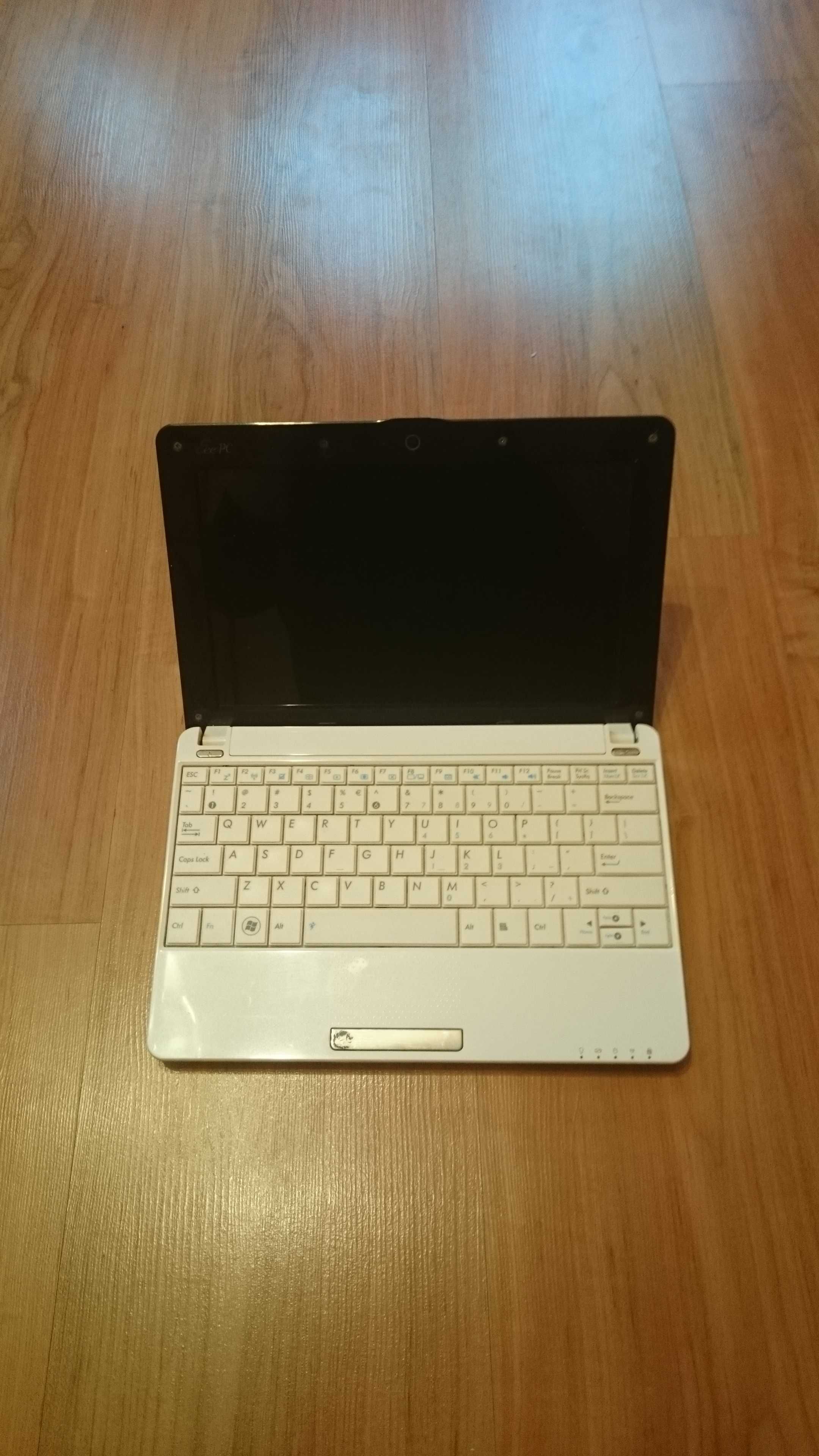 Asus eee pc 1005p w pudełku z ładowarką i etui