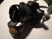 Aparat fotograficzny lustrzanka NIKON F65 z obiektywem NIKKOR 28-80mm