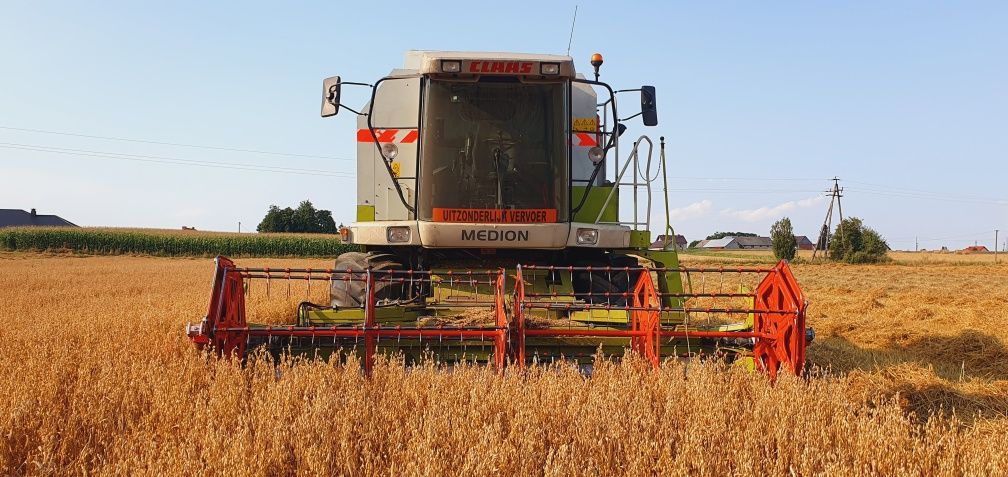 Claas Medion 310 4x4 Perkins skladany heder 4.5m mega