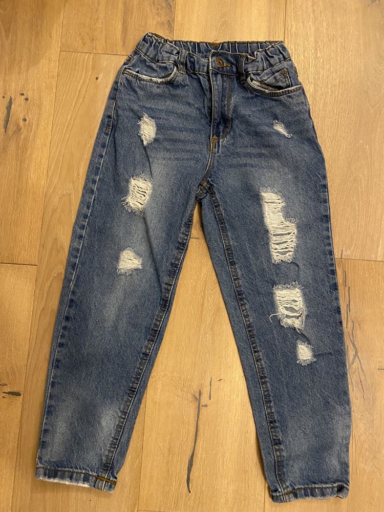 Spodnie dziewczece jeansowe z dziurami rozm 134