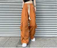 Штани широкі оранжеві брюки