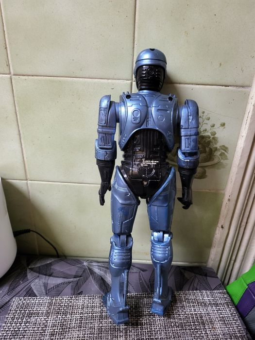 Boneco antigo articulado robocop que fala
