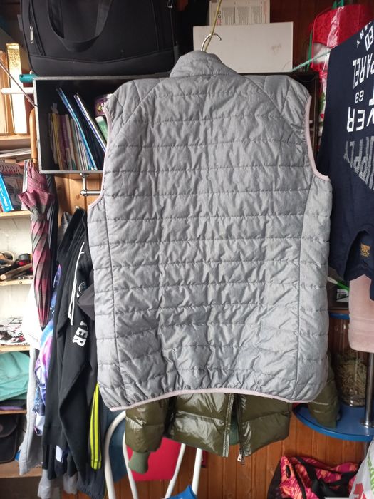 Продам  жилетку серый цвет