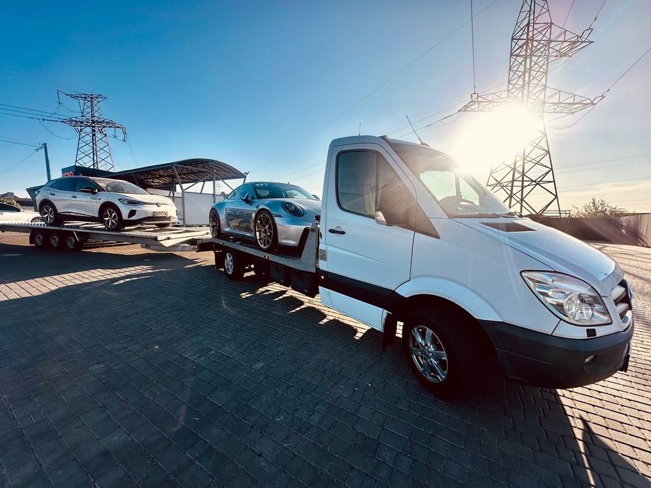 Евакуатор/автовоз/лавета/доставка авто з Європи/перевезення по Україні