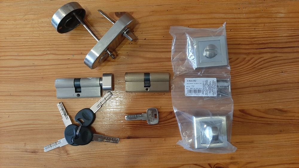 Замок дверной врезной,цилиндры замка,накладки цилиндра,ручки дверные.