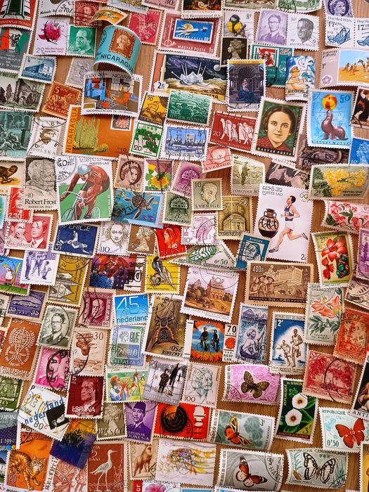 Znaczki pocztowe cały świat 1000szt + 100szt GRATIS