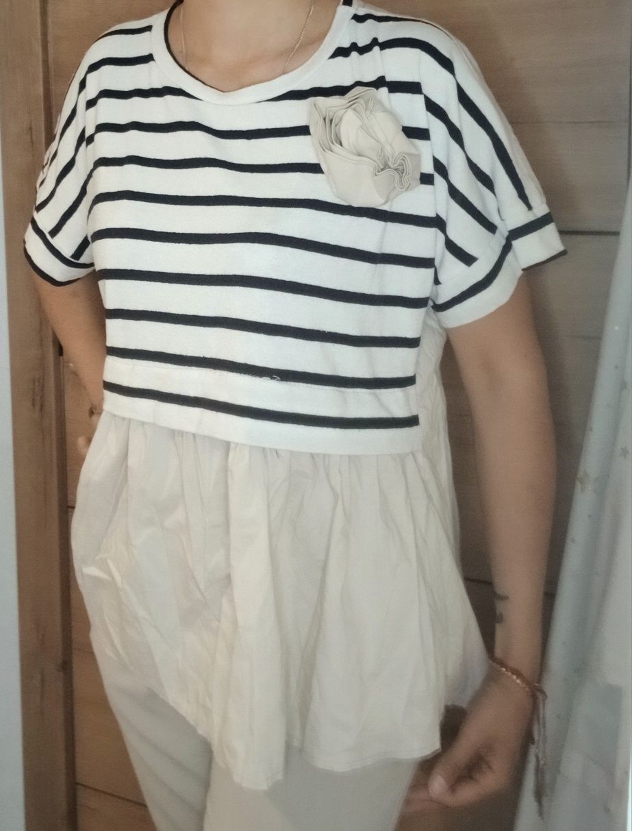 Blusa com flor..