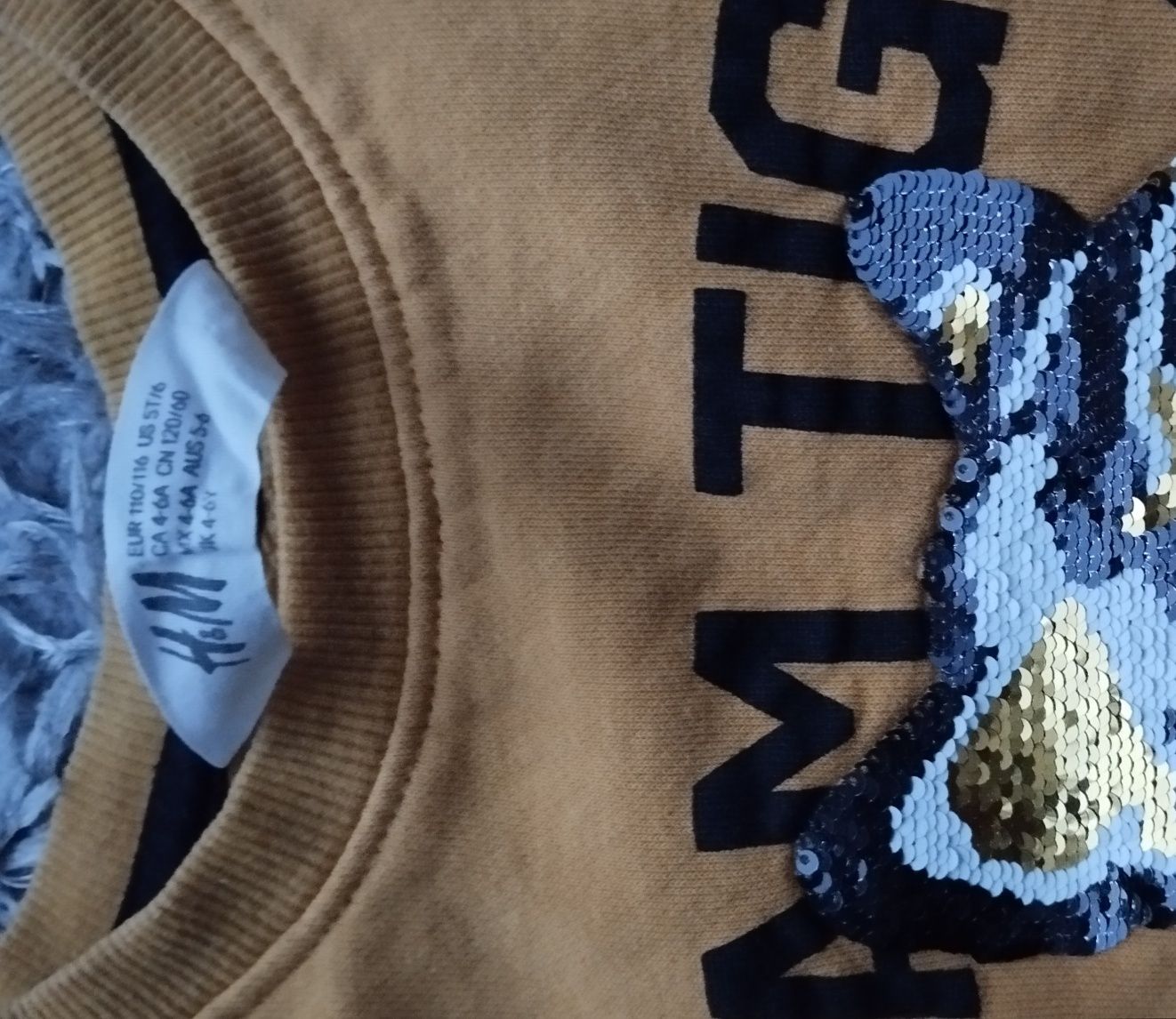Sweterek żółty H&M z tygrysem