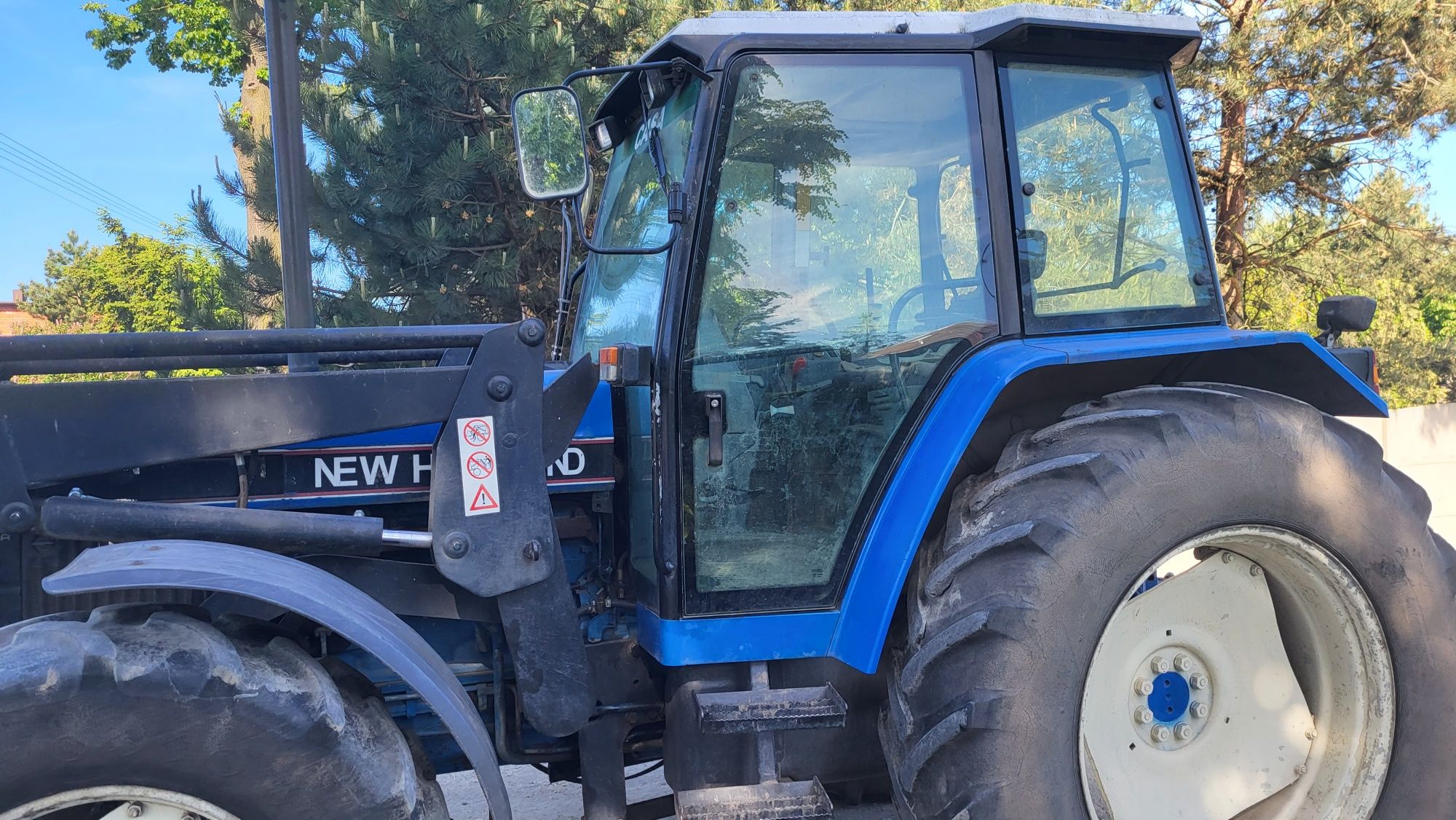 Ciągnik New Holland 7840 z turem