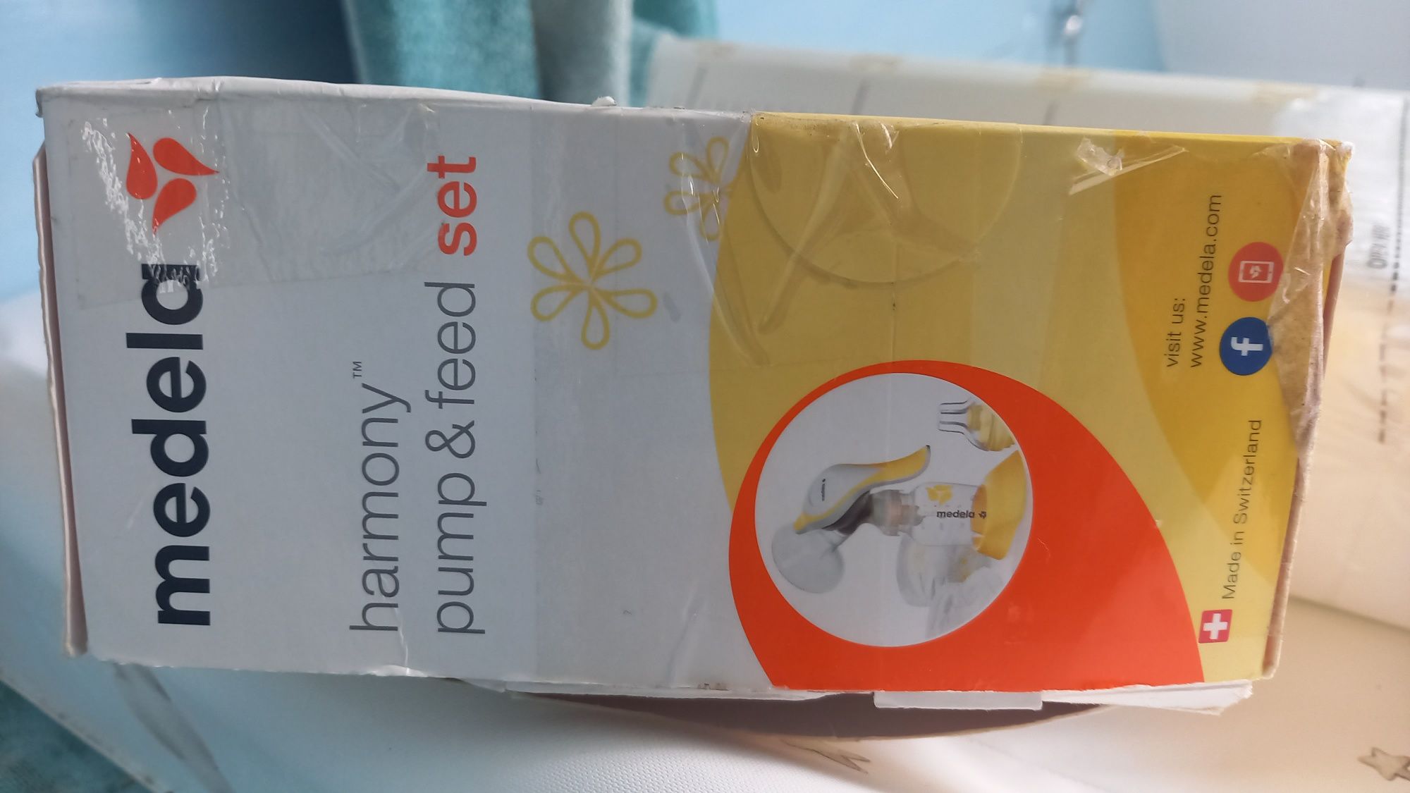 Laktator ręczny medela plus wkładki laktacyjne