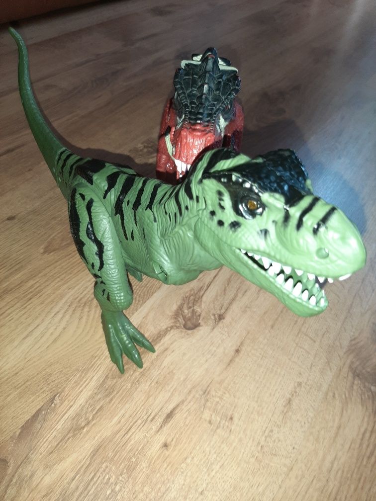 Dwa duże walczące dinozaury