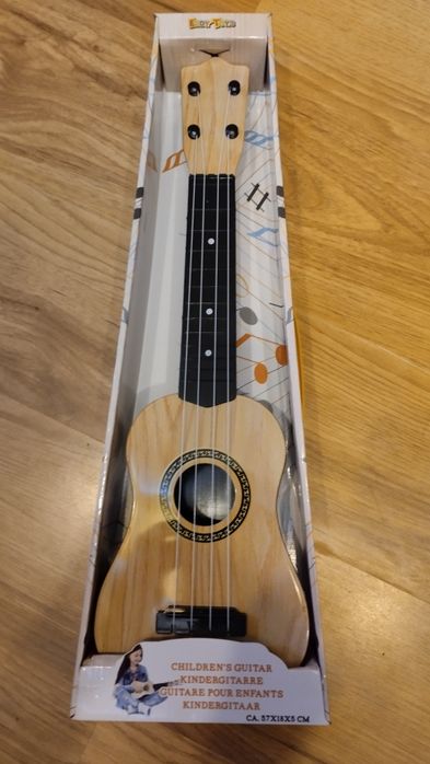 Ukulele kolor jasny. Nowe