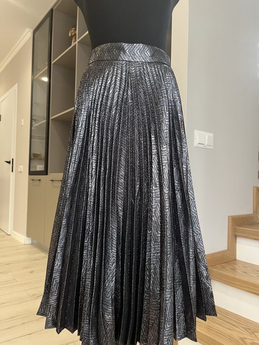 Спідниця міді з плесіровкою