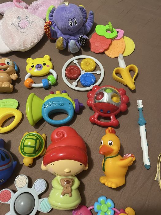 Іграшки для новонароджених. Гризунці. Брязкальця. Кліпса для соски.