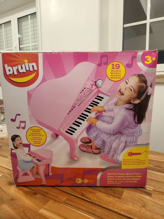 Piano bruin com banco